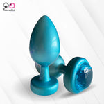 Load image into Gallery viewer, A collection of anal butt plugs in various colors, each featuring a crystal jewel at the base. The plugs are designed in a smooth, egg-shaped form.
